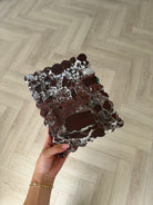 Rosa Levanto burgundy marble tray with scalloped edges styled for luxury home decor